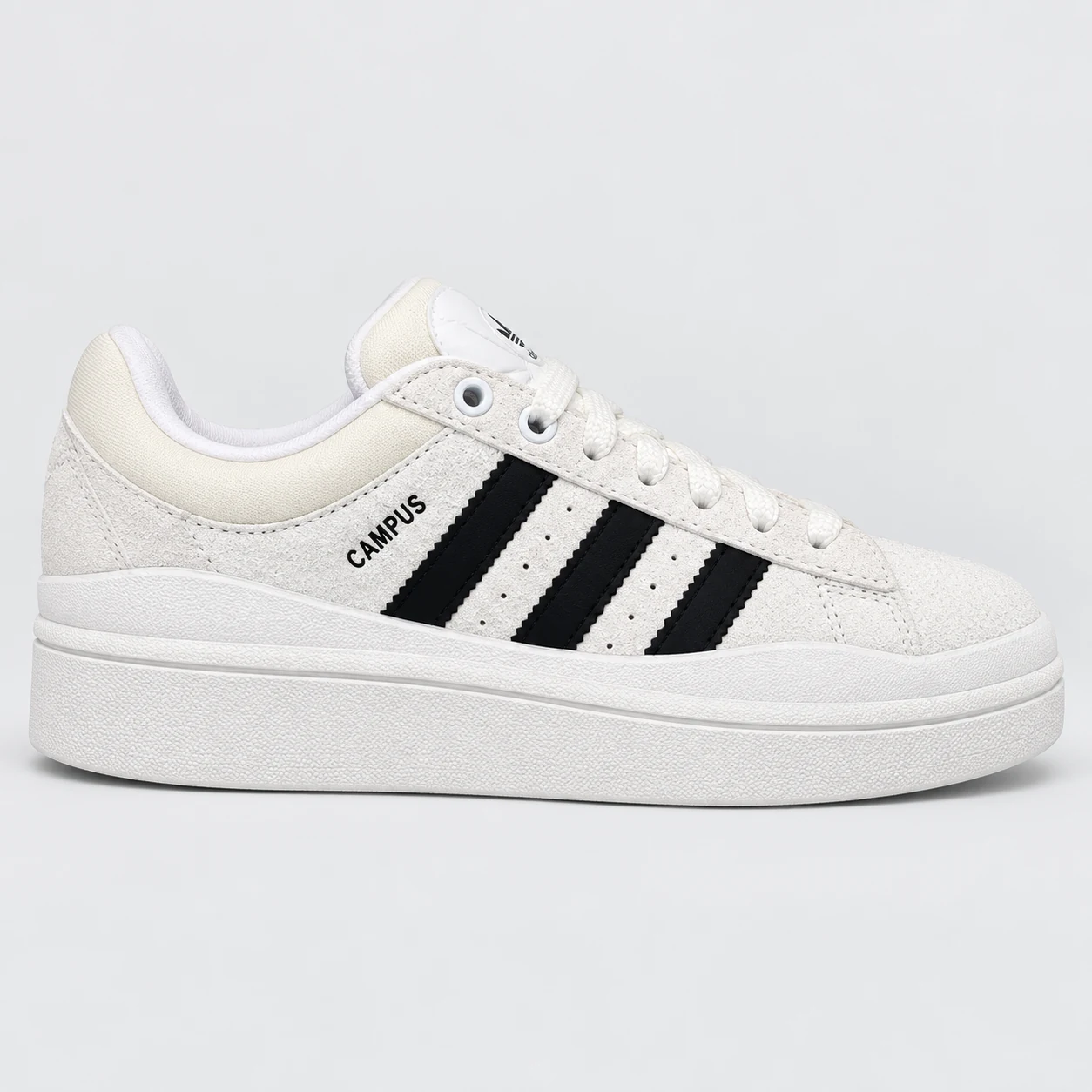adidas Campus — Cream / Black Cream / Black low-top sneaker with lace-up fastening, layered panels and three-stripe detailing. Browse the cleaned catalogue image and original supplier photo, and select your UK size from 3 to 9.